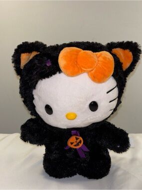 Hello Kitty Plush side stepping hallow in Black with Orange Bow and Yellow Nose